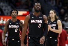 Wade roza el triple-doble en su último partido en Chicago